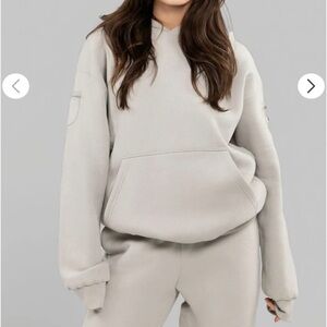 Comfrt Travel Essentials Hoodie - never worn, size small, color stone